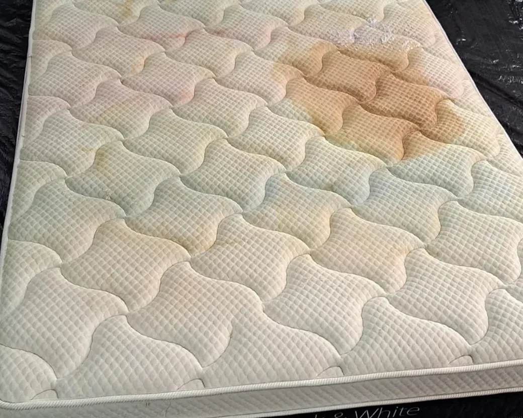 Quilted mattress before cleaning