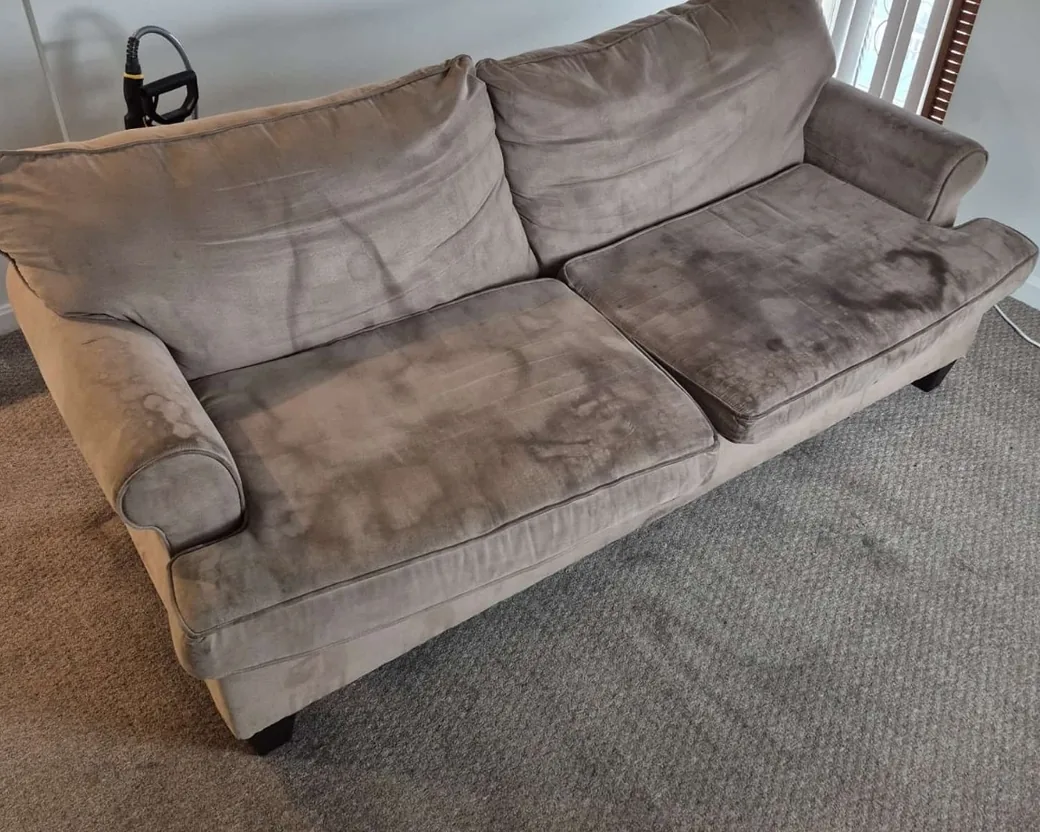 Brown microfiber sofa before cleaning